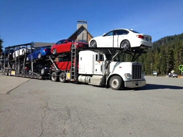 White Peterbilt Big Rig Car Hauler