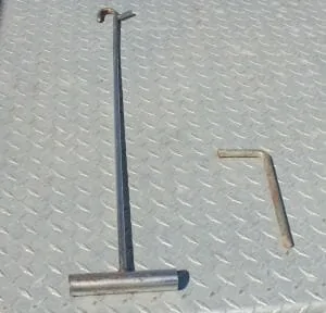 Fifth wheel hook and cam wrench