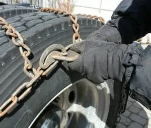 Semi truck chaining up