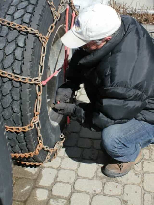 Tightening Tire Chains on Big Rig