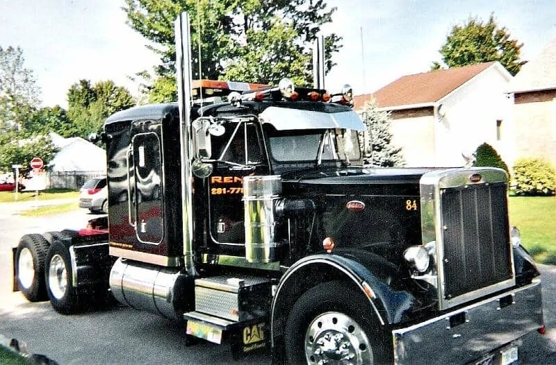 Black 84 Peterbilt 359 Round Headlights