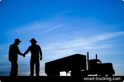 2 Old Time Truckers Shaking Hands