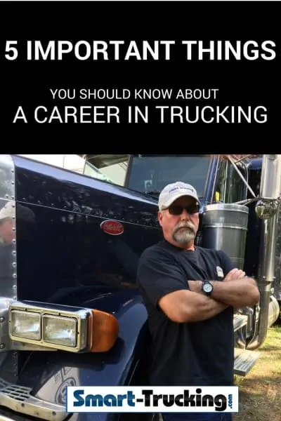 Truck Driver Standing beside Peterbilt Truck