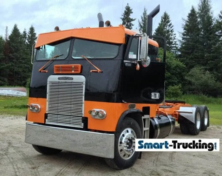 Orange Black Freightliner Cabover 