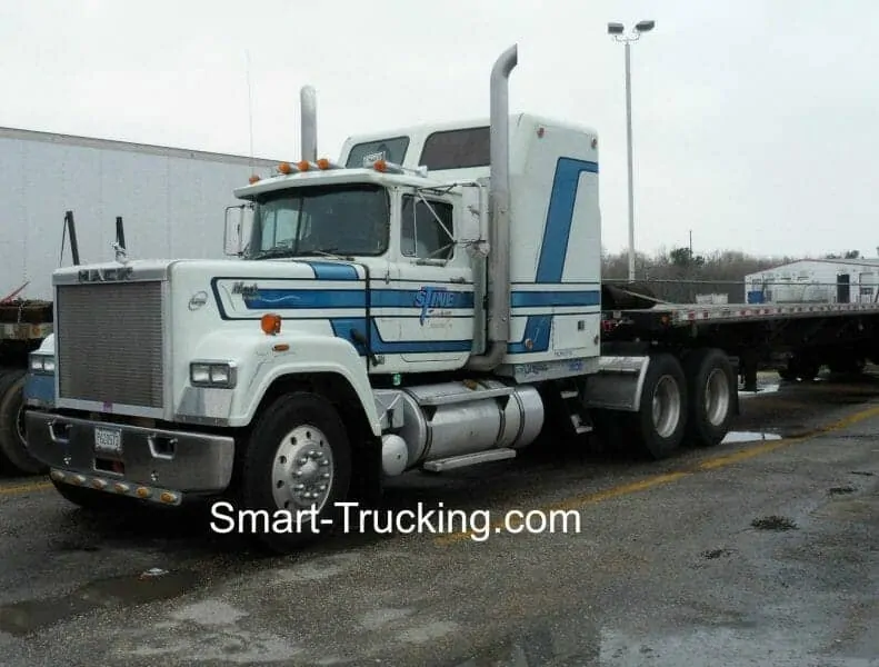 White Blue Mack Superliner Rig