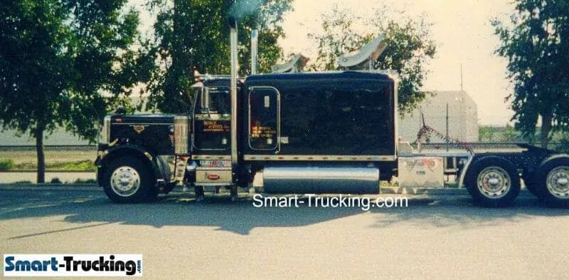 A photo of an llder Model Peterbilt Custom Large Sleeper Berth truck. 