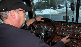 Truck Driver and Dashboard of Big Rig