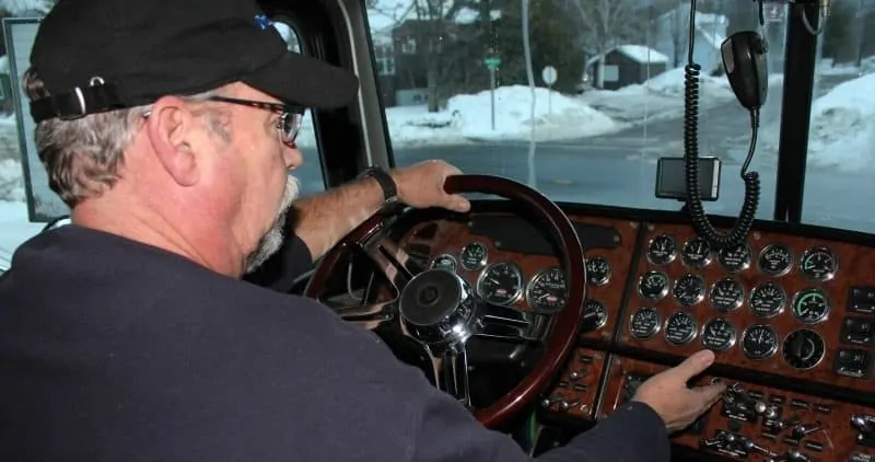 Truck Driver and Dashboard of Big Rig