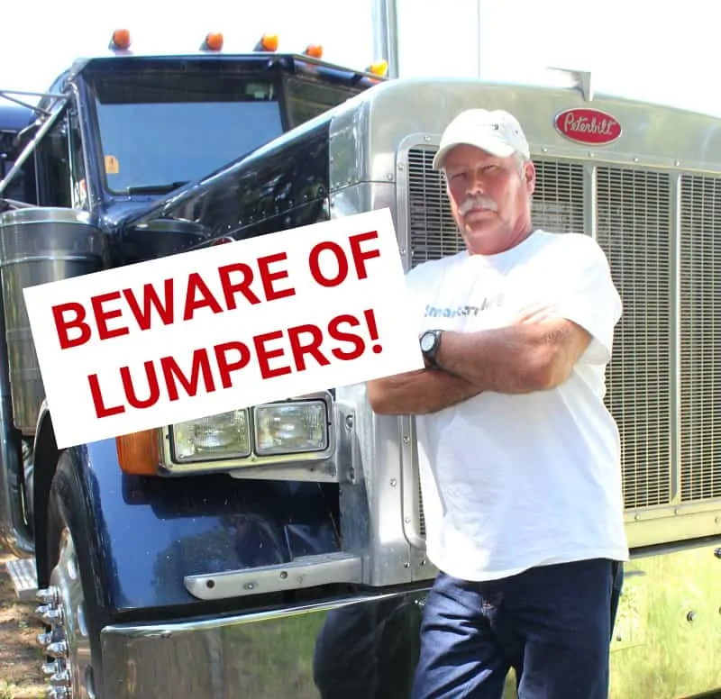 BEWARE OF LUMPERS TRUCKER LEANING ON HIS BIG RIG