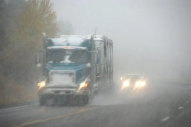 Big Rig Driving in Fog and Storm