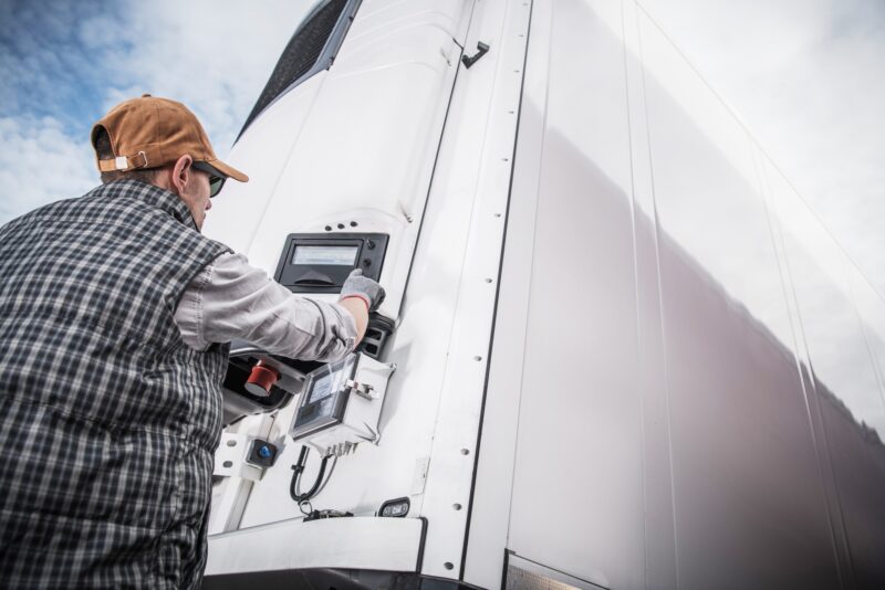 Truck Driver opening trailer doors