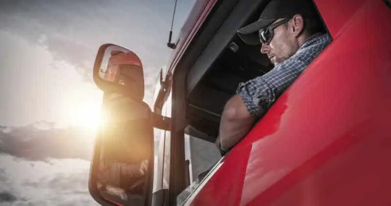 Red Semi Truck. Truck Driver Preparing For the Next Destination