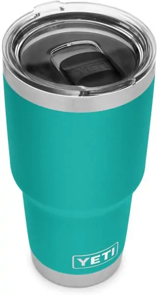 A photo of the Yeti Rambler tumbler, in turquoise blue color. It is quite large with a clear lid with a locking mouthpiece. 