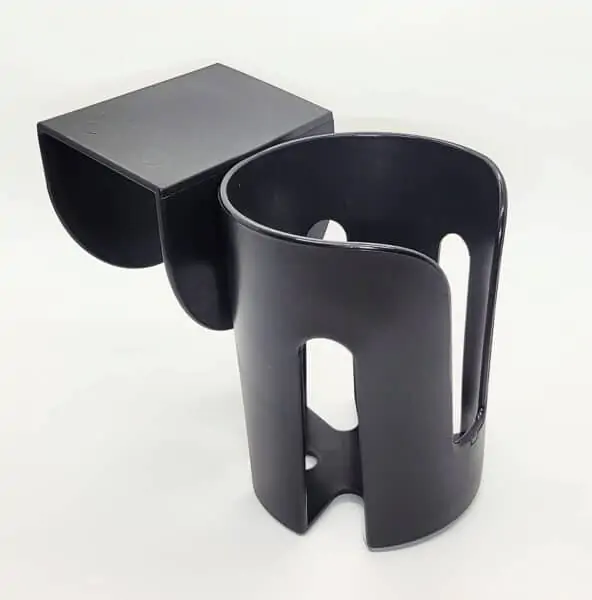 A photo of the Ledge Auto Cup Holder. It is black against a white background. 