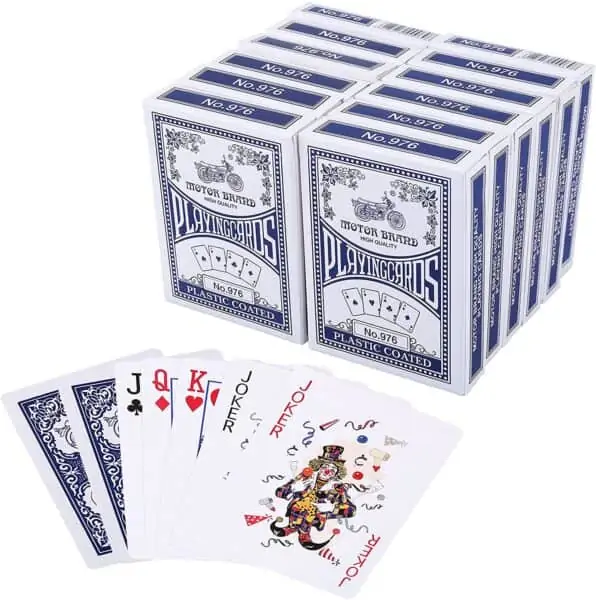 A photo of many packs of playing cards, with some spread out below. 